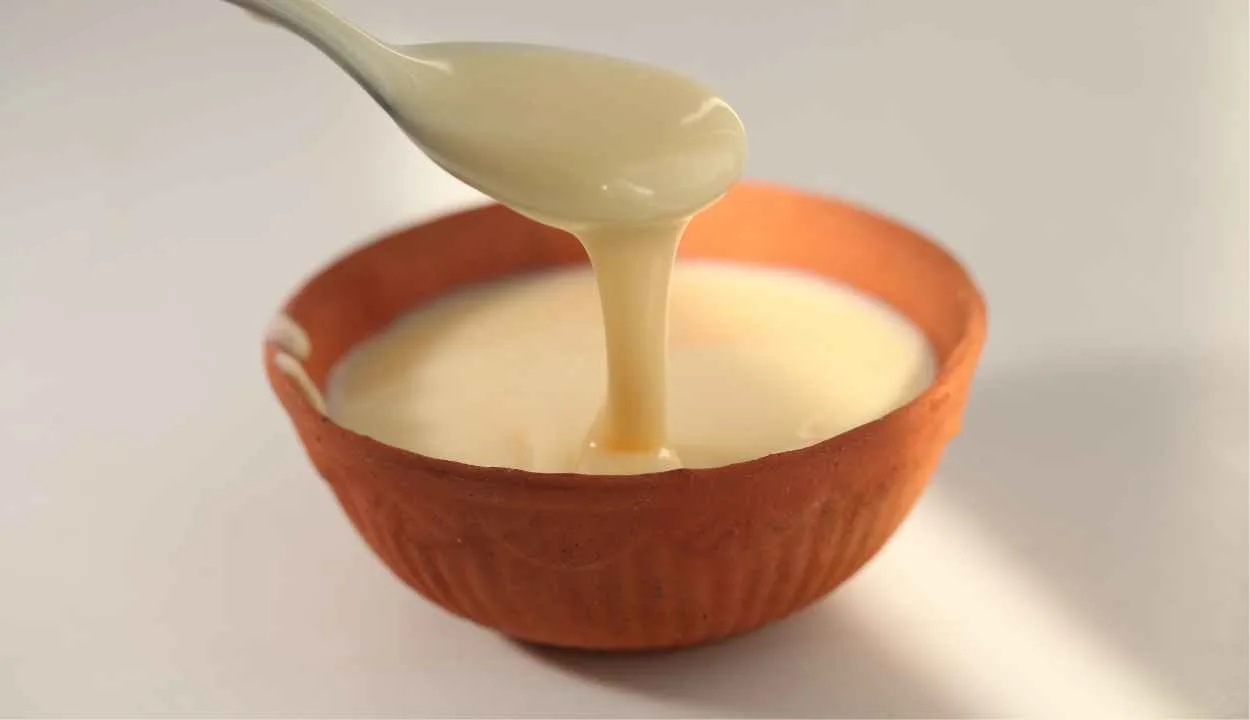 a bowl filled with condensed milk